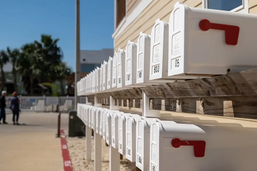 A closeup of a group of mailboxes