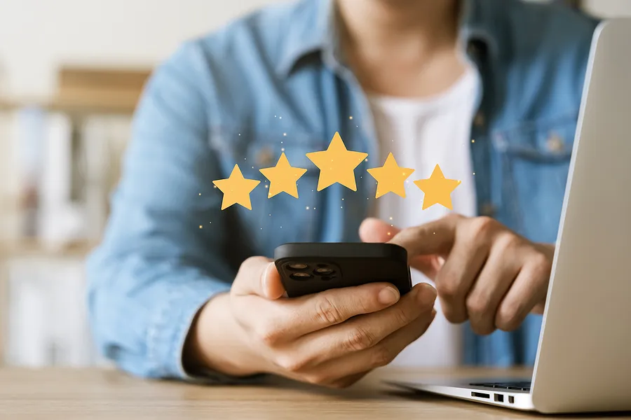 A customer rating a business with 5 stars
